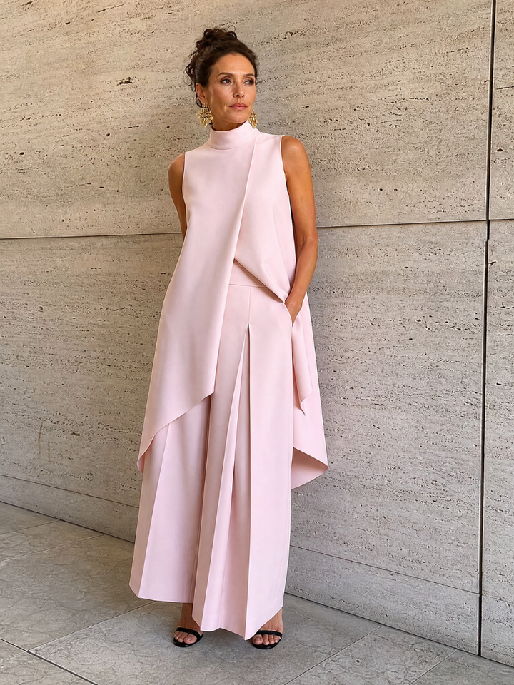 Cozima | Sleeveless Mock Neck Draped Jumpsuit